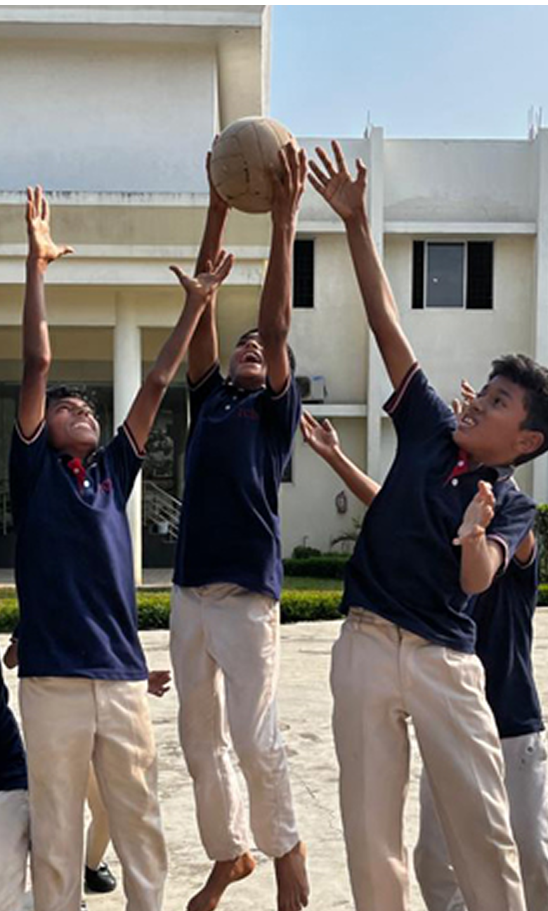 Students playing basketball