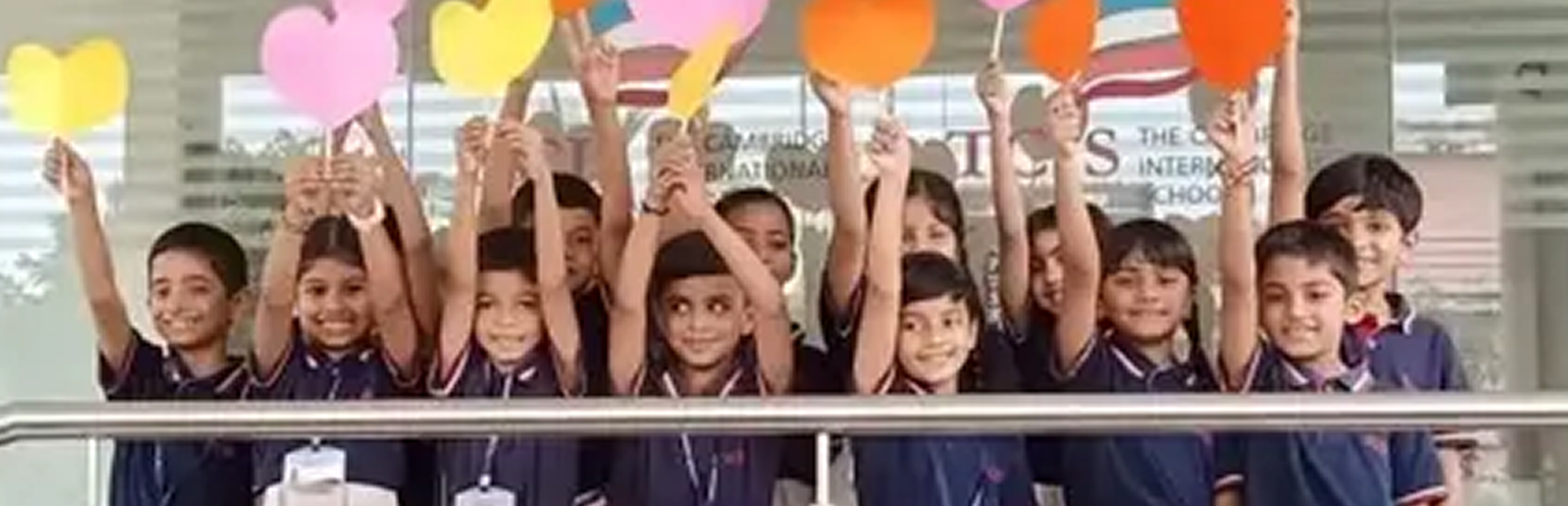 Students outdoors with globe