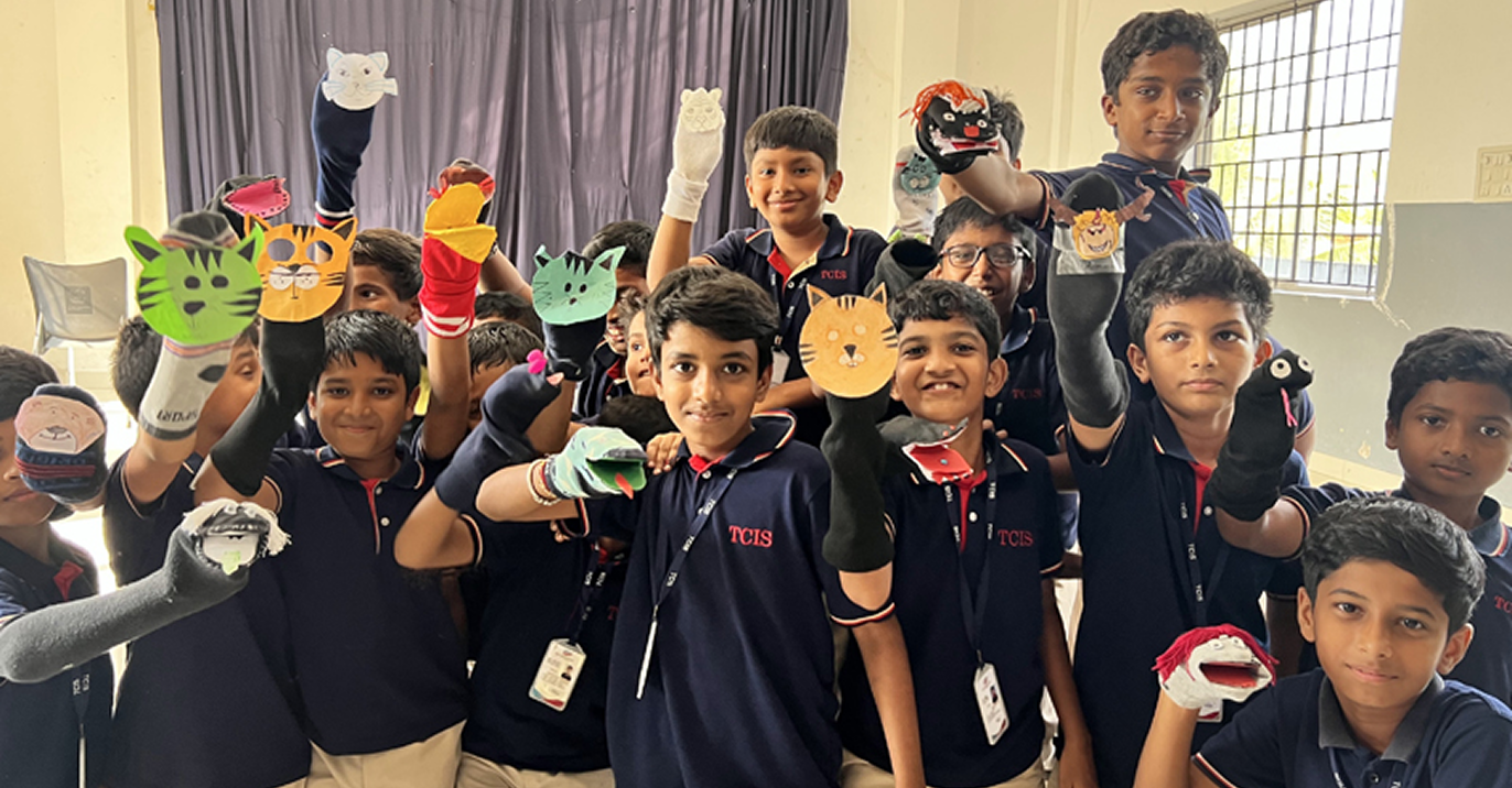 Kids with hands up