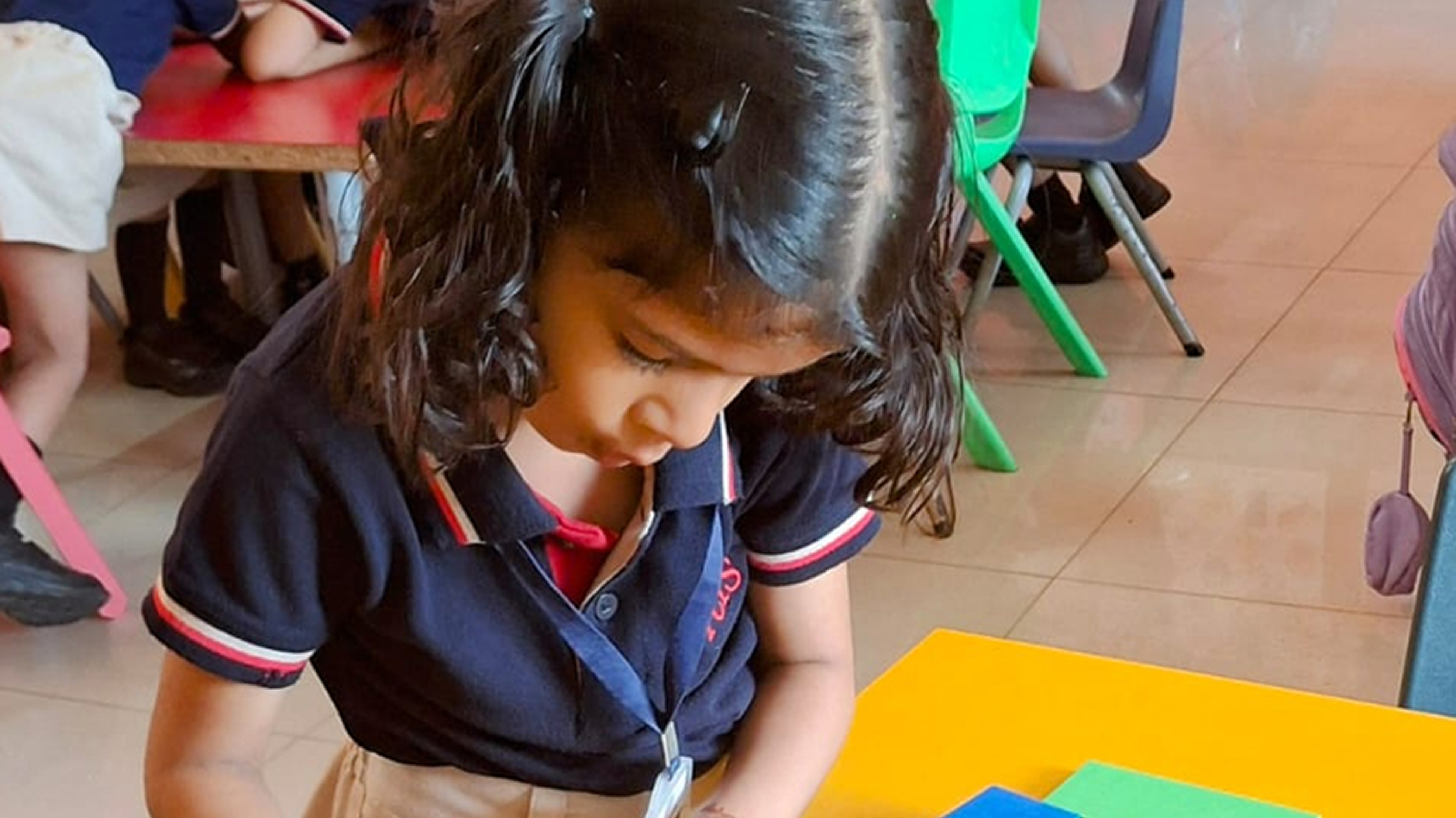 Students playing and learning in classroom